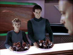 Q from Star Trek is served ten chocolate sundaes in Ten Forward