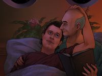 Q and Picard in Picard's bed, Picard reading a book and Q leaning into him