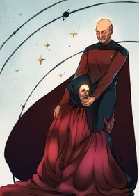 
        Q is on his knees in the judge outfit, looking up at Picard, wearing the season 1 uniform with a cape, holding Picard's legs as Picard gently lifts his face.
      
