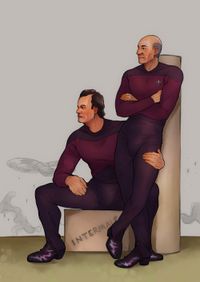 
        Q sits on a box next to standing Picard and holds his hip. Both wear s1 uniforms and look off-camera in the same direction. Enterprise D and space in the background.
      